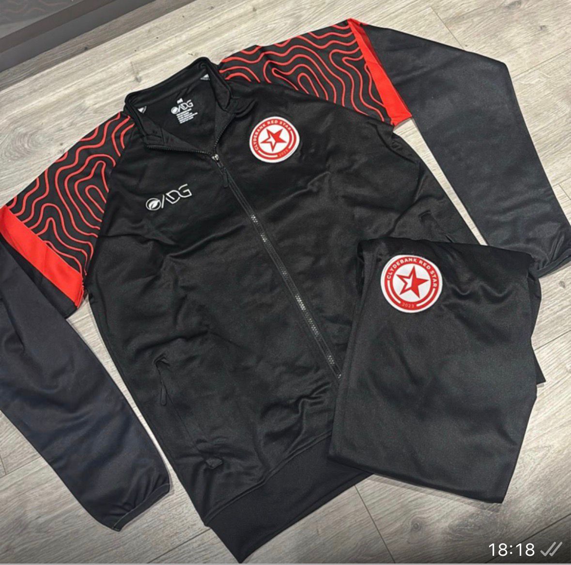 Wave Tracksuit - Black tracksuit with red wave pattern design